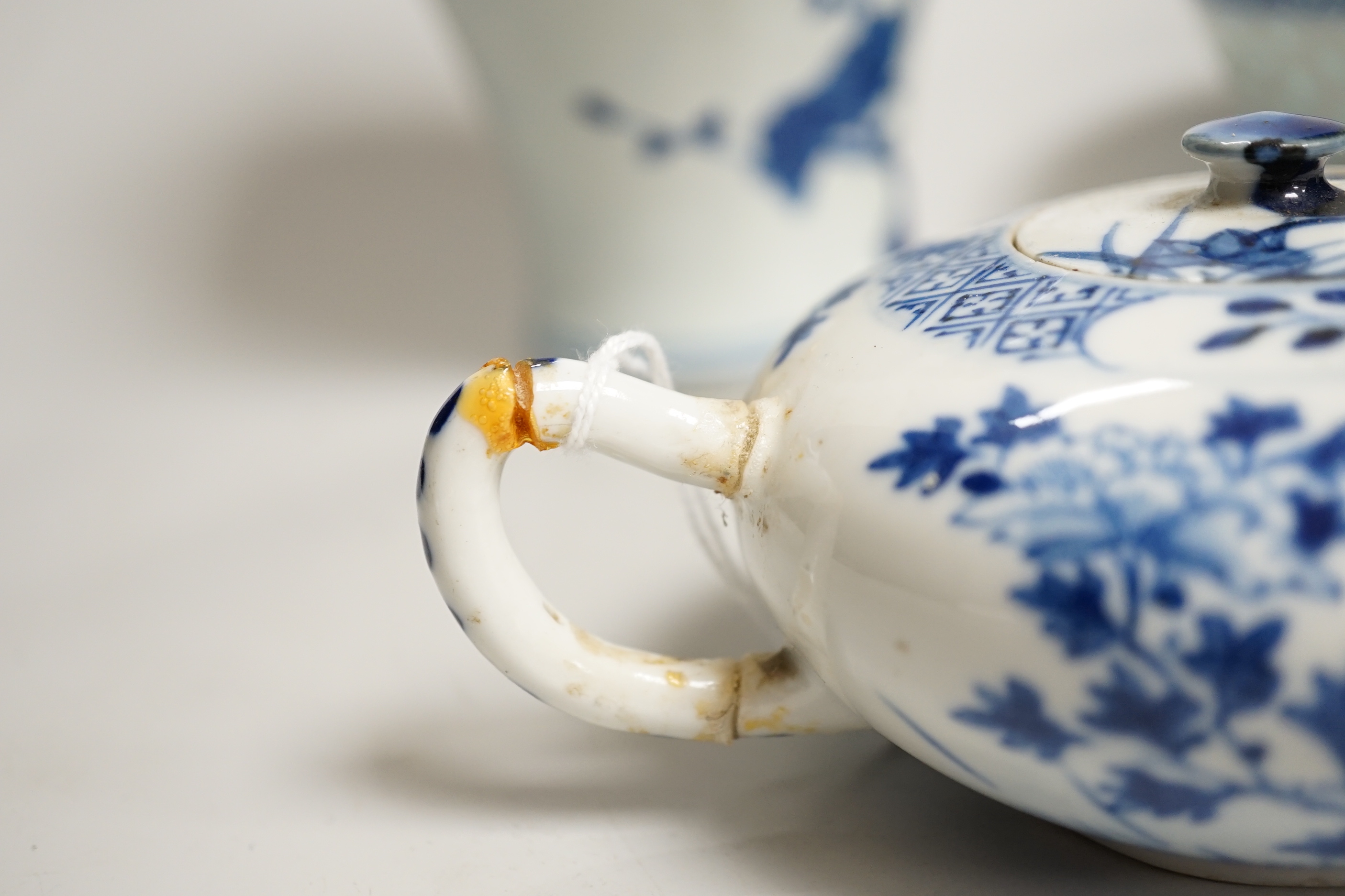 Chinese blue and white ceramics and a miniature famille rose vase, the largest 25cm high